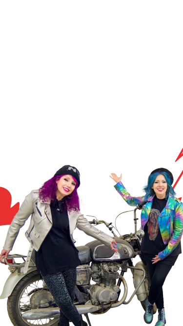 Tish and Snooky, Co-founders and owners of Manic Panic, posing with vibrant hair colors and edgy style.