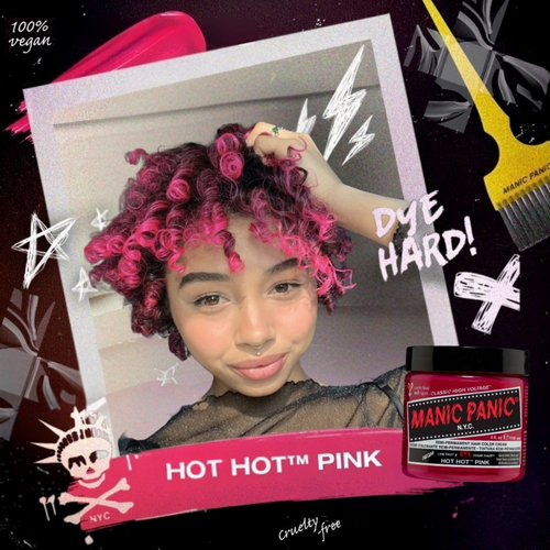 Model with short wavy, curly hair dyed in Hot Hot Pink Classic pink hair dye, displaying a vivid, eye-catching pink hair color for a fun and edgy look.