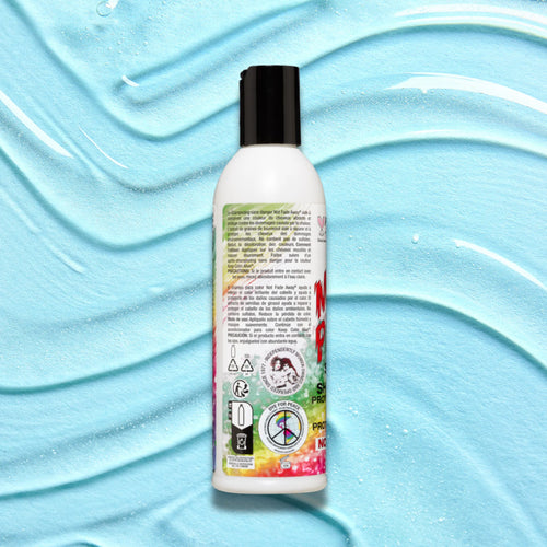 Manic Panic Not Fade Away Color Safe shampoo back of bottle on a blue textured background