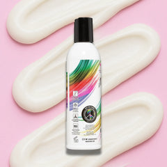 Bottle of hair product with colorful label on a pink background  of Keep Color Alive conditioner