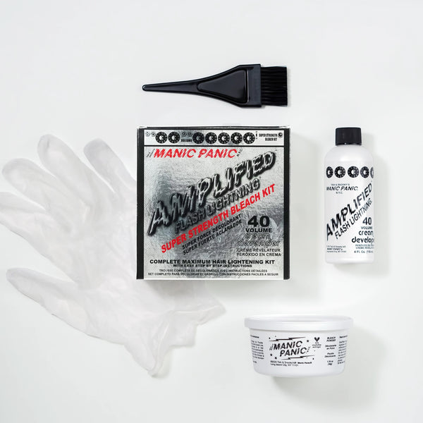 Manic Panic Amplified Flash Lightning 40 Volume Bleach Kit with developer bottle, bleach powder, tint brush, and protective gloves on a white background.
