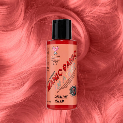 Manic Panic Amplified Coraline Dream peachy-pink hair dye bottle on coral hair background.