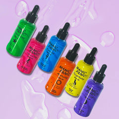 Set of Manic Panic bath and body oil bottles in various colors on a matching purple background