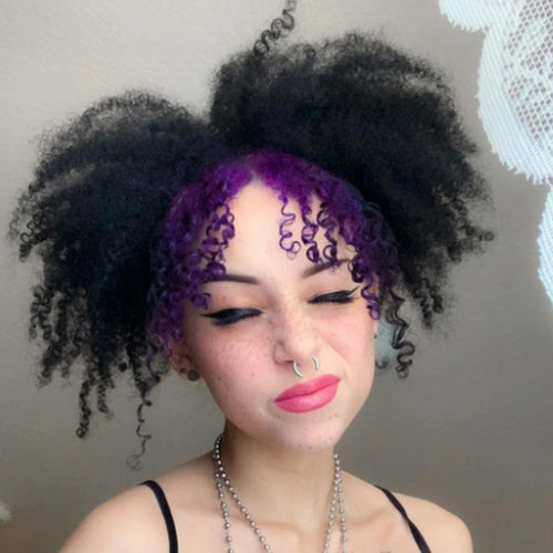 model with curly texture hair results in  black hair color created with Manic Panic Raven Black hair dye