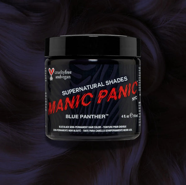 Manic Panic Classic High Voltage semi-permanent hair dye in shade Blue Panther a vibrant, vegan hair color. Image shows a jar of Blue Panther hair dye placed on top of a wavy blue black  hair swatch.
