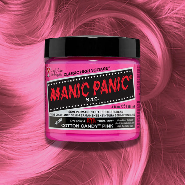 Manic Panic Classic High Voltage semi-permanent hair dye in shade Cotton Candy Pink a vibrant, vegan hair color. Image shows a jar of Cotton Candy Pink hair dye placed on top of a wavy pastel  pink hair swatch.
