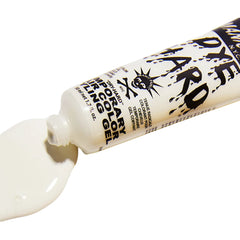 Tube of Manic Panic Dye Hard Temporary Hair Color Gel in Virgin White with creamy white gel squeezed out.