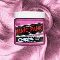 Manic Panic Classic High Voltage semi-permanent hair dye in shade Fleur a vibrant, vegan hair color. Image shows a jar of Fleur hair dye placed on top of a wavy violet pink pastel hair swatch.
