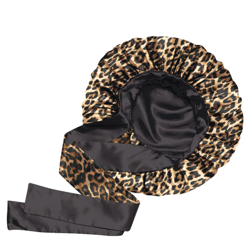 Leopard print bonnet with black satin lining on a white background