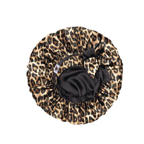 Leopard print bonnet with black interior on a white background