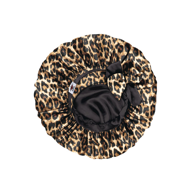 Leopard print bonnet with black interior on a white background