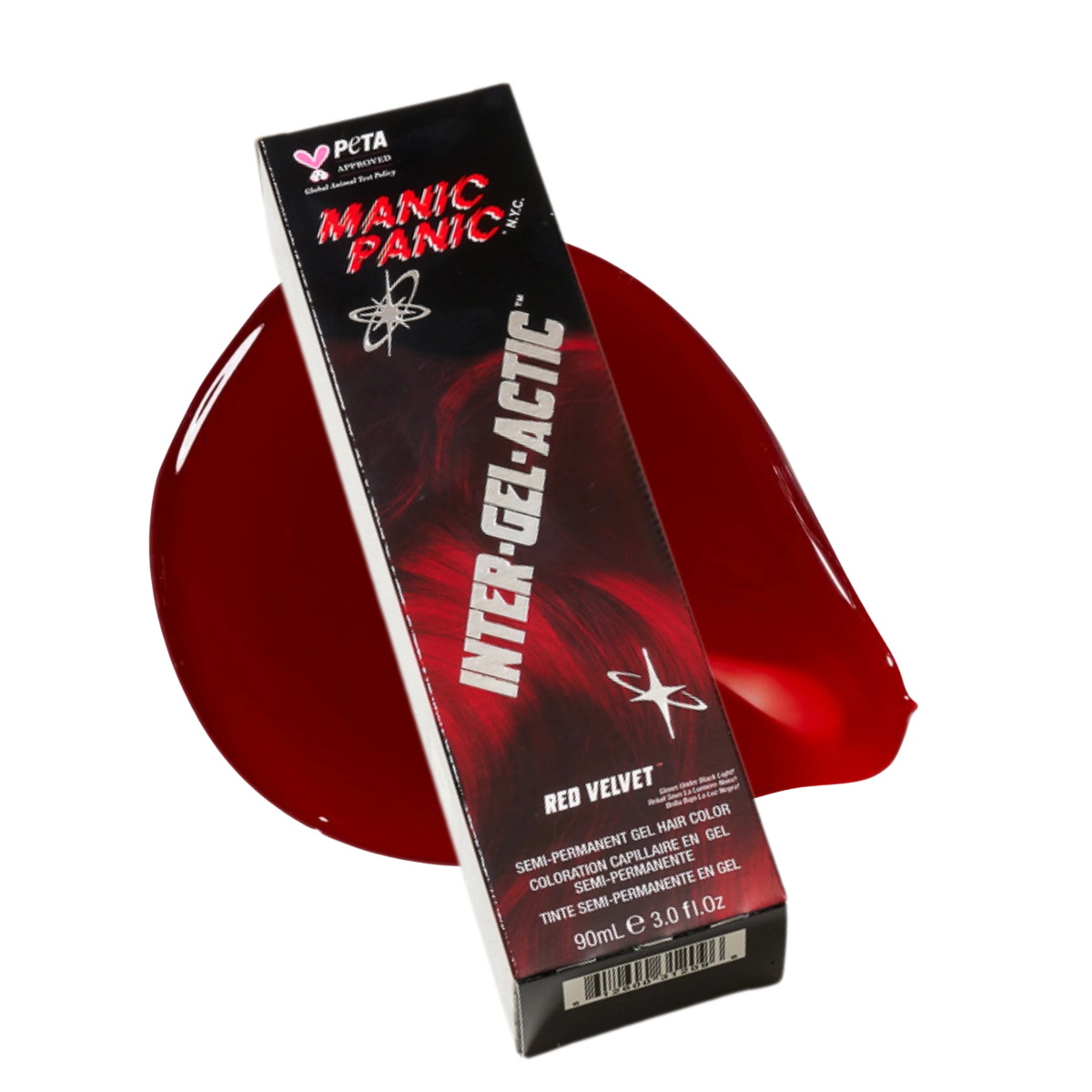 Manic Panic Red Velvet semi-permanent hair color kit packaging shown diagonally over a glossy red gel pool on a white background.