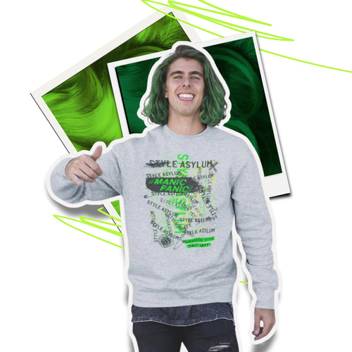Person wearing a gray sweatshirt with green text and graphics, surrounded by green hair and abstract designs.