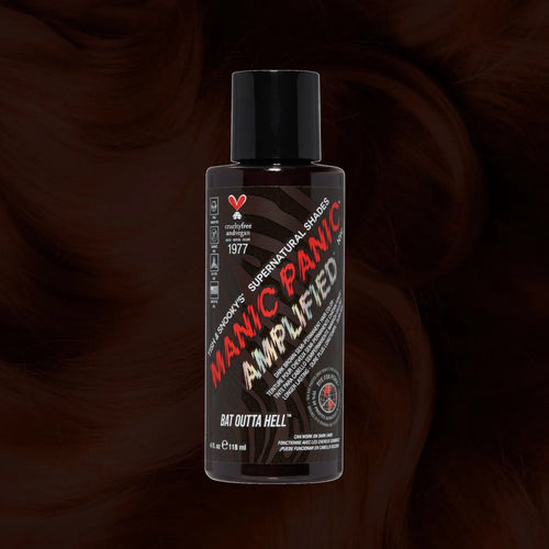 Manic Panic SuperNaturals Bat Outta Hell hair dye bottle on brownish-black wavy hair