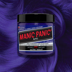 Manic Panic Classic High Voltage semi-permanent hair dye in shade Ultra Violet a vibrant, vegan hair color. Image shows a jar of Ultra Violet hair dye placed on top of a wavy ultra violet hair swatch.
